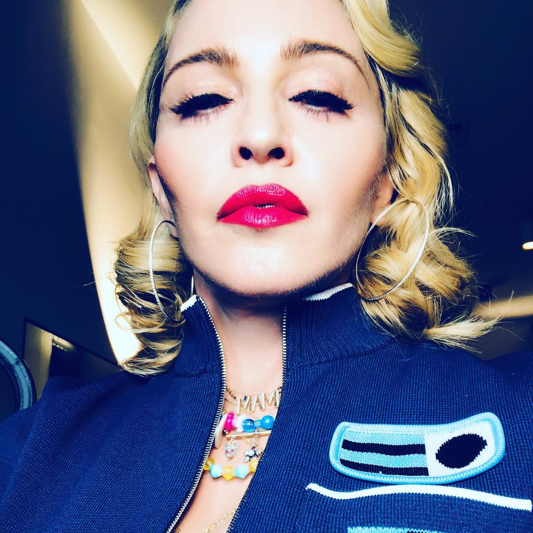 Madonna encantada com a noite em Lisboa Holofote