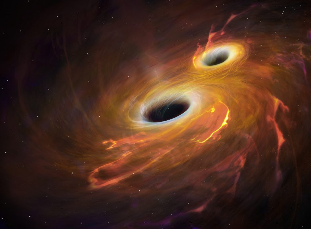 Astrónomos detetam sinais do dramático espetáculo de buracos negros massivos a fundirem-se