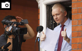 Assange diz que polícia britânica tentou entrar na embaixada (FOTOS) 9