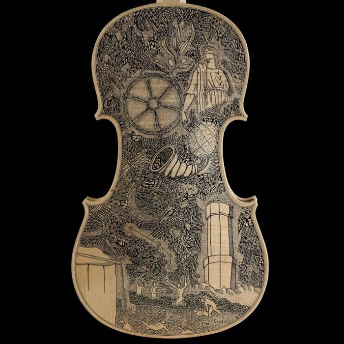 Visão  O artista que anda a pintar o Inferno de Dante em violinos