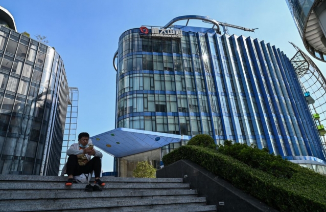 A general view shows the Evergrande Center building in Shanghai on September 22, 2021. (Photo by Hector RETAMAL / AFP) (Photo by )