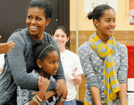 Michelle Obama com as filhas, Sasha e Malia